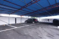 晋州 コンマ セルフチェックイン モーテル - 駐車場
