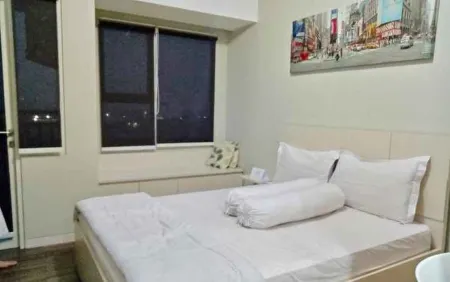 Cozy Room Pesona Mares Lima Отели в г. Beji