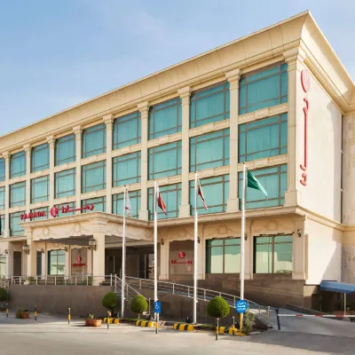 Ramada by Wyndham Riyadh Hoteles cerca de Zoo de Riyadh