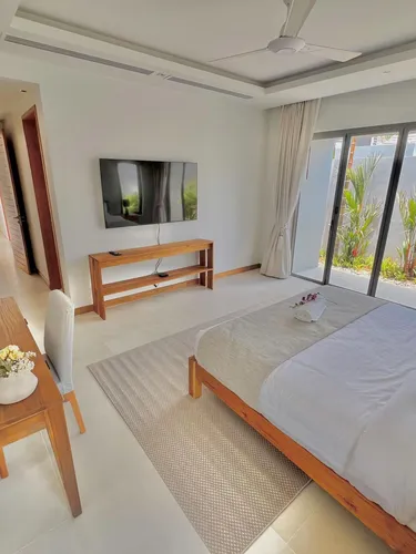 รูปภาพของLuxury brand new villa with maid Anchan Tropicana