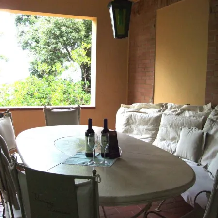 Large and very well furnished apartment in a villa, with garden and pool. D.