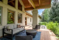 Ski bus stops at front door, court sports and indoor game room, bike path