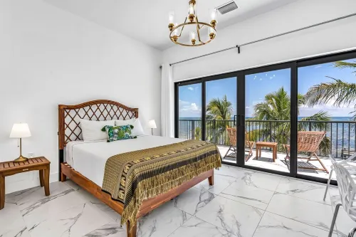 Wide Horizon oceanfront.  4 bedroom, 4 ½ bath,  kayaks, pool + observation deck.