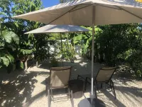 Tiki Garden Getaway SPA and outdoor living. Close to beaches without the costs!!