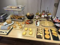 Kyriad Prestige Pau - ZÉNITH - Palais des Sports - breakfast