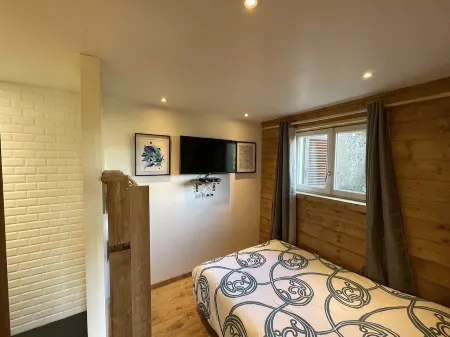 La Gallerie Du Domaine des Lupins Отели рядом с достопримечательностью «Camping Verte Vallée : dans les Vosges proche Gérardmer avec piscine et gîtes»