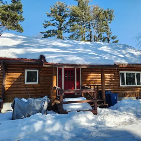 cozy lake house, full log cabin on beautiful shell lake, w/ wonderful loft.