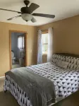 Roomy home with spacious fenced in backyard and fire pit.