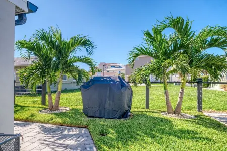 THIS STUNNING home is RENOVATED and furnished  W/Beach Access a block away!