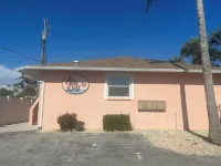 Beautiful waterfront condo with a boat dock, pool, and across from the beach