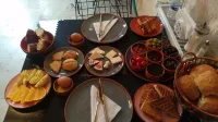 Avlu Cave House - servizio colazione
