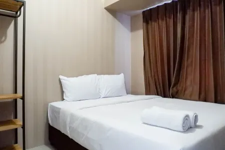 Comfy and Exclusive 2Br Apartment at Tanglin Supermall Mansion Отели рядом с достопримечательностью «Universitas Ciputra Surabaya»