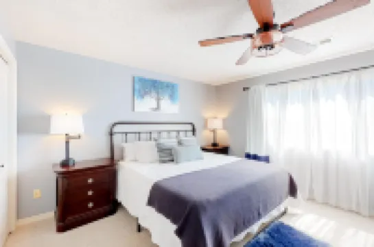 All-season retreat on golf course with indoor/outdoor pools, hot tub, central AC