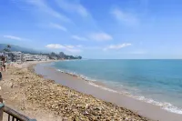 Unique Beachfront Home with Stunning Views - Charming Coastal Haven