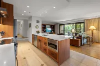 Spacious Living Area and Private Lanai - Charming Garden Retreat