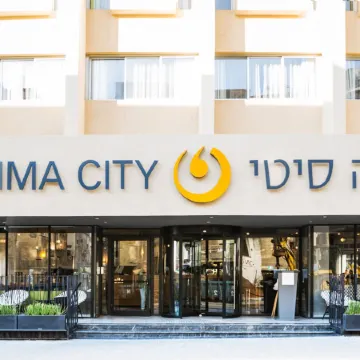 Prima City Hotel Отели рядом с достопримечательностью «Пляж Гордон»