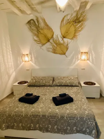 小雕像旅館家庭旅館 酒店