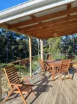 cosy cottage with wood heater, surrounded by bushland