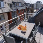 Huswell - Centrally Located Apartment with Sunny Terrace