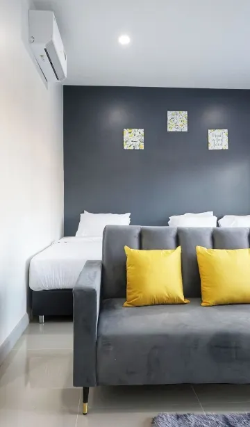 ห้องซูพีเรียทริปเปิลพร้อมระเบียงและวิวสวน