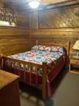 Adventurer's  Lodge, a charming 3-bedroom cabin with WiFi in quiet Lansing, WV.