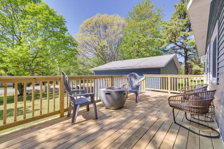 Charming Gated Retreat with Lakes, Pools, Private Sunroom & Game Room!