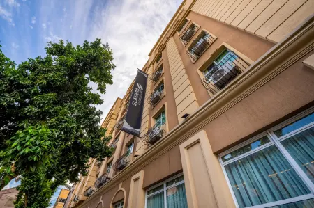 Rockefeller by Slaviero Hotéis Отели рядом с достопримечательностью «Botanical Garden of Curitiba»