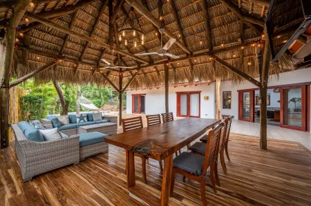Spacious 3-Bedroom Villa. with a pool, rancho- STEPS away from Langosta Beach.