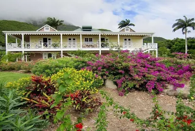 Charming Nevis Cottage with pool and ocean view on grounds of Hermitage Inn