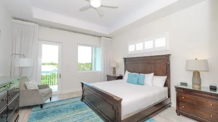 7 Mile Beach Penthouse with Private Beach Club. Ocean views from Roof Terrace.