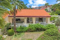 Royal Beach House with sea view and large community pool.