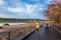 The Riverwood Forest Retreat - Kanha Hotels in Narna