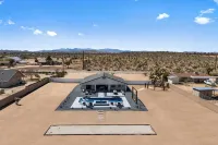 Bocce PoolSpa Game Room Firepit Modern Oasis Yucca Haven by AvantStay