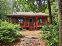 Escape to Howie's Camp: Unwind and Recharge at This Lakefront Log Cabin
