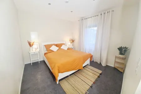 Ferienwohnung mit Sonnenterrasse und Blick auf die Sauer Отели в г. Лангзур