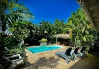 Heavenly spot with saltwater pool and typical gazebo in pretty garden