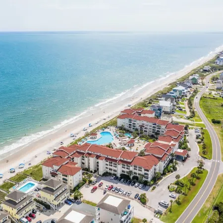 Breathtaking ocean views, resort-style pools, onsite restaurant, steps to beach.