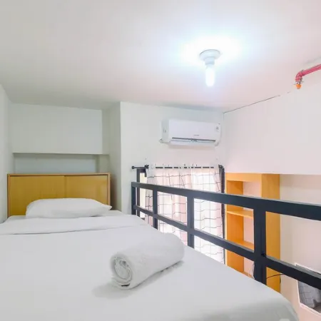 Minimalist and Comfortable Studio Dave Apartment by Travelio