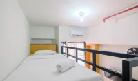 Minimalist and Comfortable Studio Dave Apartment by Travelio