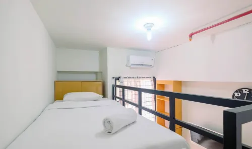 Minimalist and Comfortable Studio Dave Apartment by Travelio