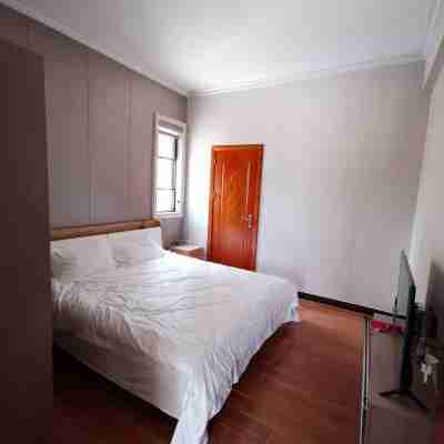 開心之旅哈哈度假別墅（學前北路1號分店） Rooms