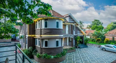 Saffron Beach Bistro & Cottages Отели в г. Энтеббе