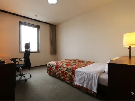 Komatsu Green Hotel Отели рядом со станцией JR Awazu station