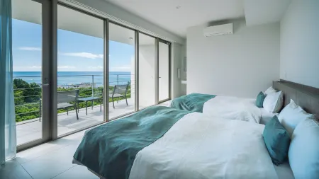 Blue Rela Luxe Resort Okinawa Отели рядом с достопримечательностью «National Institute of Information and Communications Technology Okinawa Electromagnetic Wave Technol»