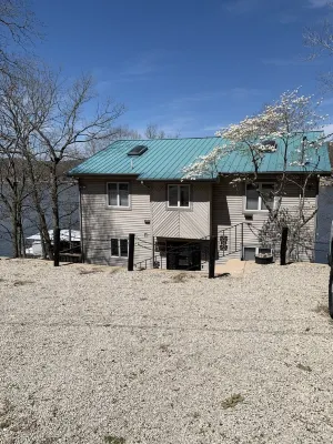 Lakefront pet-friendly home/private dock with boat slip and two place PWC lift.