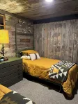 Cozy up in this rustic Stone Lodge and relax by the fireplace