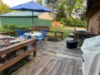 Log Cabin house on 10.5 acers of wooded land. Accommodates 20 plus guest.