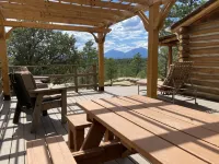 Rustic Oak Log Cabin in the Ponderosa Pines great for a quiet get away.