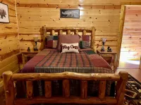 Beautiful cabin with fireplace and wrap around porch and private upstair balcony