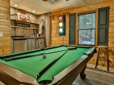 Creekfront Cabin with Waterfall. Hot Tub, Fire Pit, Gameroom, and more.